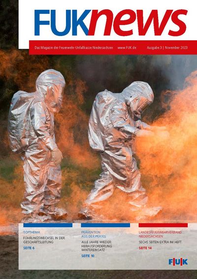 Das Titelbild zeigt zwei Feuerwehrmitglieder in Hitzeschutzkleidung